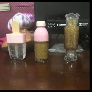 gold and clear lip gloss